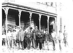 Group of men in front of Altamont Hotel in Occidental, California, on March 8, 1914