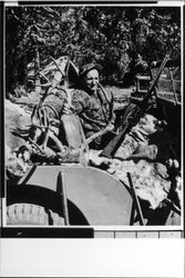 Bob Fiori sitting in jeep with deer antlers and hides