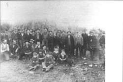 Men from Occidental on Christmas tree lot