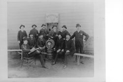 Several men sitting outside Brooklyn Brewery