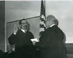Rex H. Sater sworn in as Sonoma County Superior Court Judge by presiding judge John H. Moskowitz, March 12, 1976
