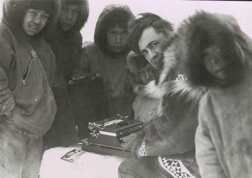 Gathering around the typewriter