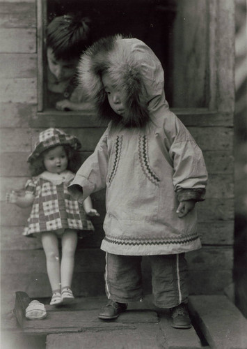 Child and doll