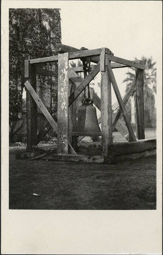 Old Bell in Wooden Frame