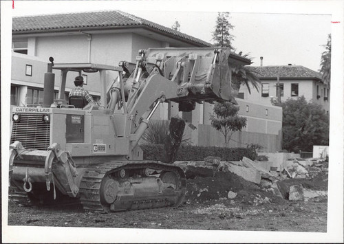 Worker Using Tractor