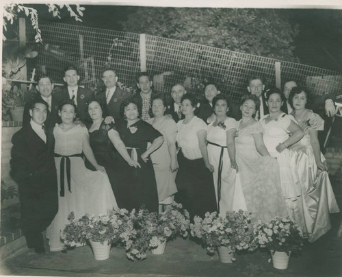 Nine couples at the Club de Madres de Santa Maria Center Winter Dance in the Belvedere area of East Los Angeles