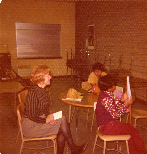 Two students and the school librarian at Robert F. Kennedy Elementary School