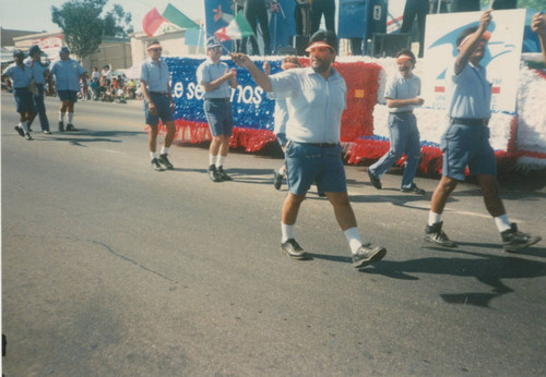 USPS employees march in the East Los Angeles Parade
