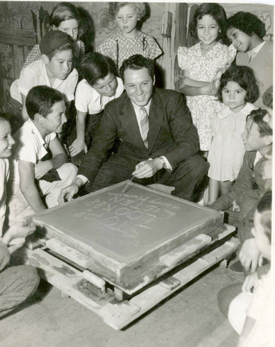 Actor Henry Hunter and children at the Strand Theatre