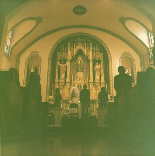 Diana Guerrero and Raul Felix at the altar