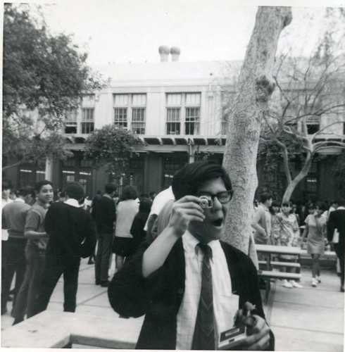 Student with a mini camera at Belvedere Junior High School, East Los Angeles, California