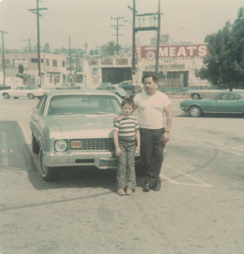 Father and son, parking lot