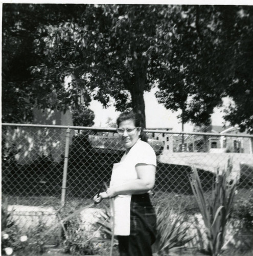 Petra Martinez in the front yard, East Los Angeles, California