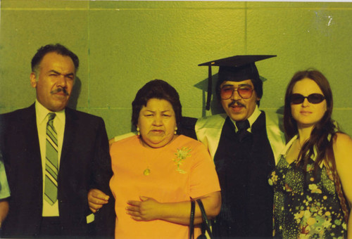 Jesse Ramirez's college graduation photo with his parents and girlfriend, Monterey Park, California