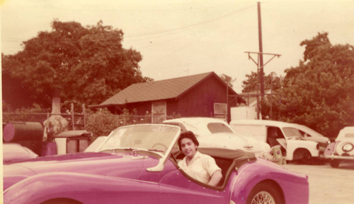 Martha Garcia at the wheel of a Triumph