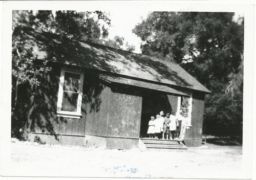 Children in front of a schoolhouse in Topanga, California