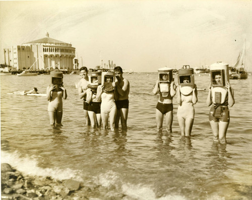 Ocean divers in Avalon Harbor, Avalon, California