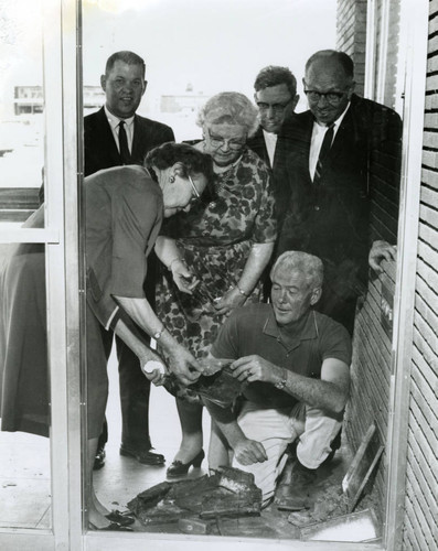 Removal of the 1950 Lancaster Library plaque from the Fig Avenue library location, Lancaster, California