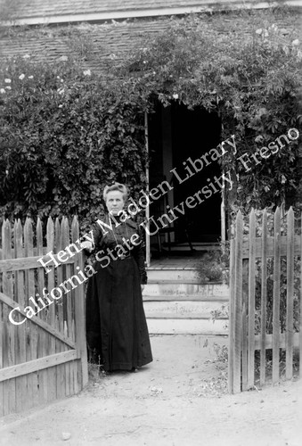 Woman at gate