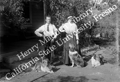 Man and woman with three collies #2