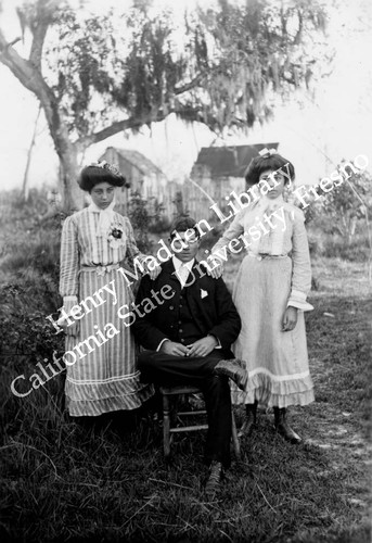 Young man and two young women