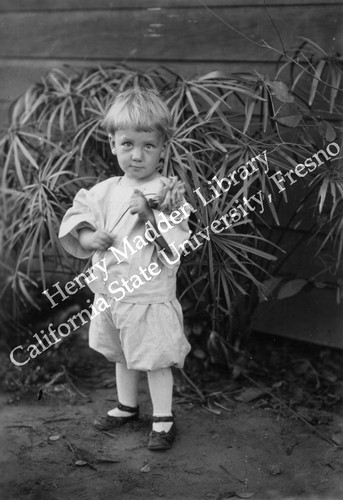 Young boy with rose