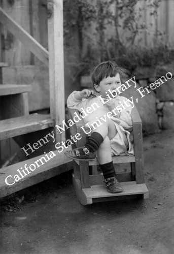 Boy in rocking chair