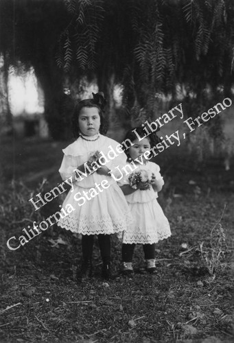 Two girls with bouquets