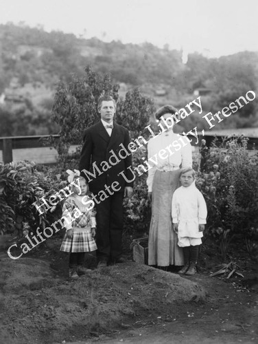 Father and mother with two young children #2