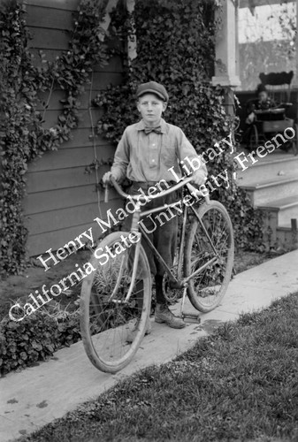 Boy with his bike