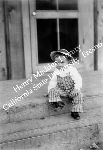 Toddler sitting on the steps