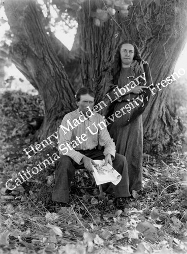 Man and woman in front of cottonwood tree #2