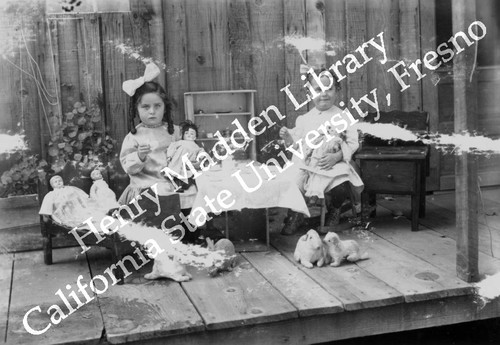 Two girls having a tea party