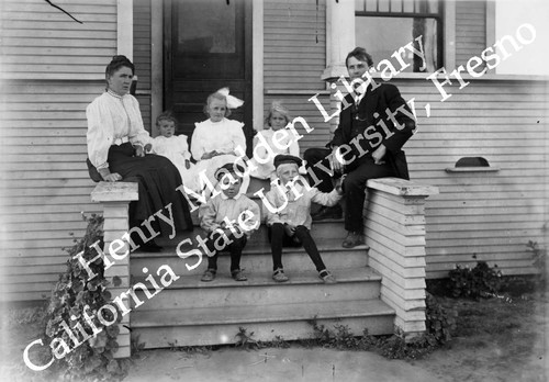 Family of seven on the steps