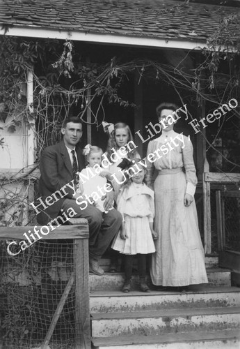 Family on the porch steps