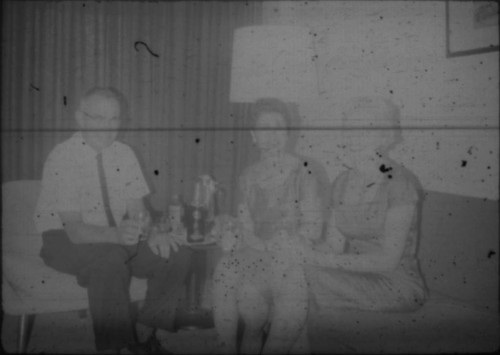 Alice Peters and others sitting on couch