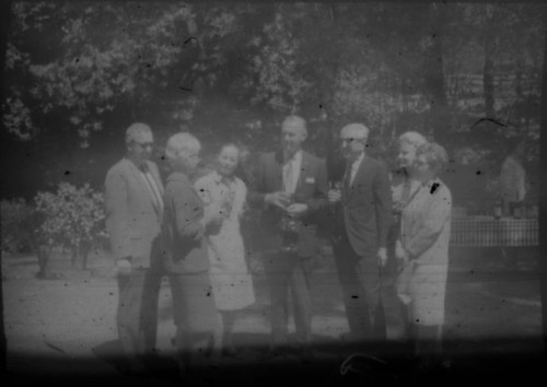 Group of tourists gathered at a picnic