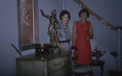 Alice Peters with guest in Peters residence