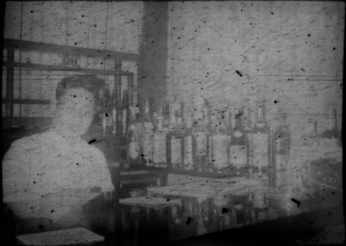 Bartender mixing drinks at a bar