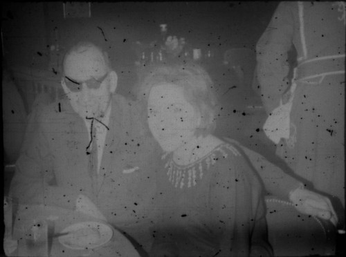 Unidentified man and woman in restaurant