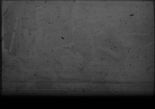 Alice Peters and unidentified woman sitting in front of cabin at Myrtle Lake