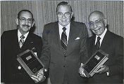 James D. Mayer presenting Brick and Mortar Award to Aram and Leon Peters