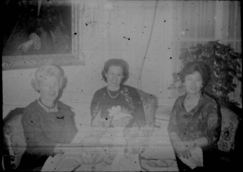 Alice Peters seated with two unidentified women