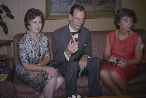 Alice Peters with guests in Peters residence
