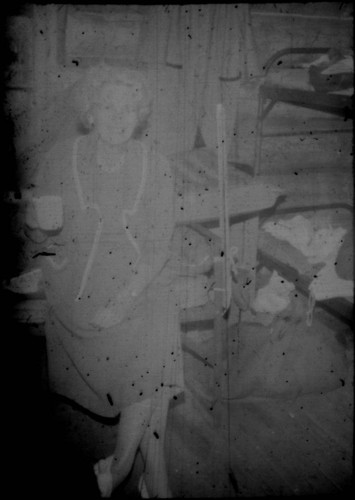 Unidentified woman (Peters relative?) seated in a cabin