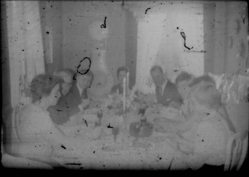 Alice Peters and others gathered around a table