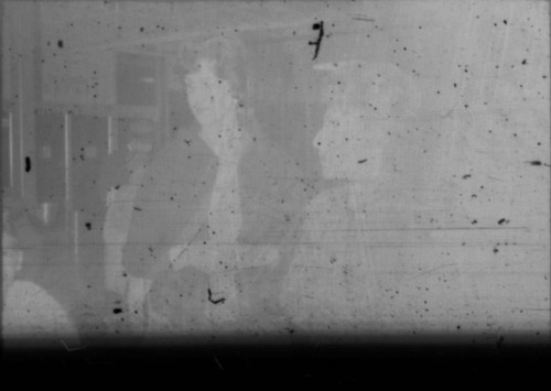 Two unidentified women standing in airport