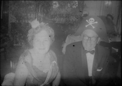 Unidentified man and woman wearing party attire aboard the M/S Stella Polaris