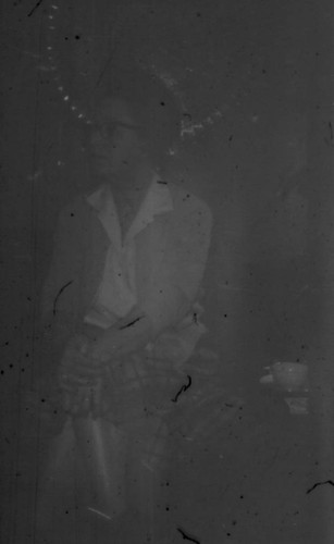 Unidentified woman (Peters relative?) seated on a couch