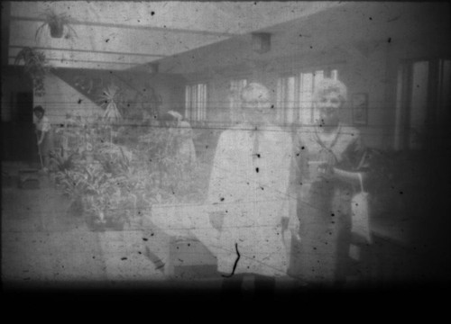 Doctor and woman inside hospital